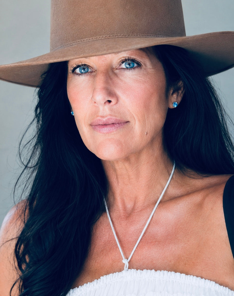 Kimberly Gibson wearing a wide-brimmed hat